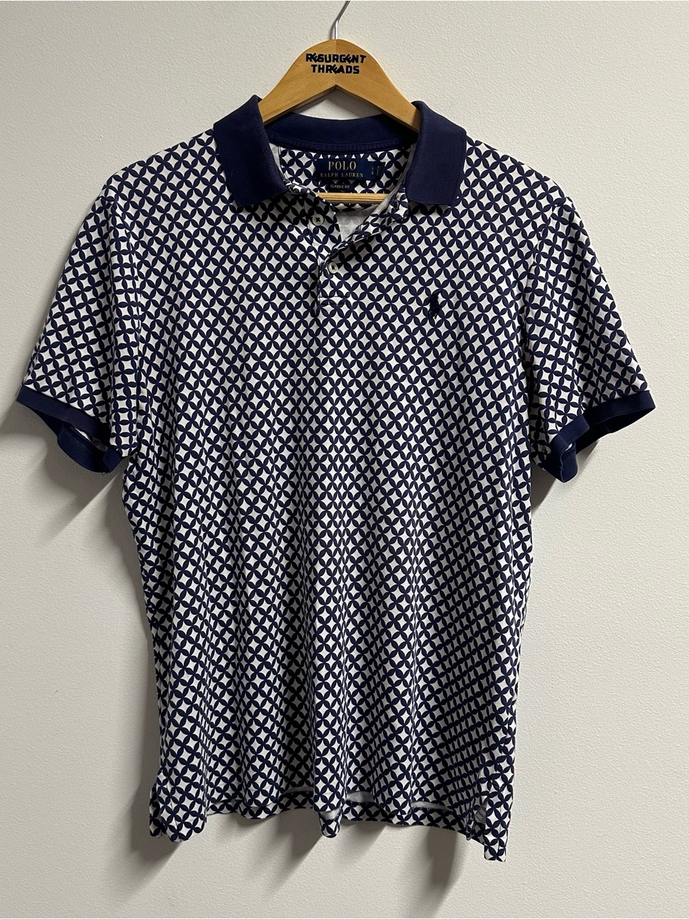 Polo Ralph Lauren Navy & White Geometric Pattern Polo Shirt
Size: Large